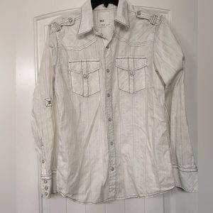 Pearl snap shirt perfect to dress up with for a night out